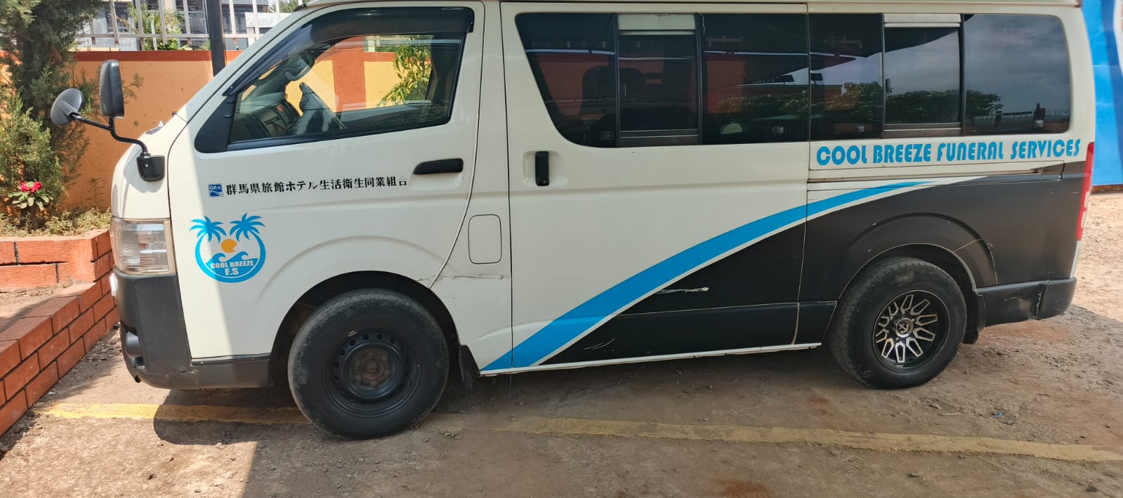 Cool Breeze Funeral Services Toyota HiAce van, side view