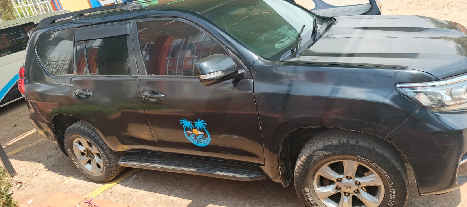 Cool Breeze Funeral Services black Toyota Land Cruiser Prado, side view