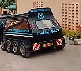 Cool Breeze black ceremonial hearse with blue and white markings